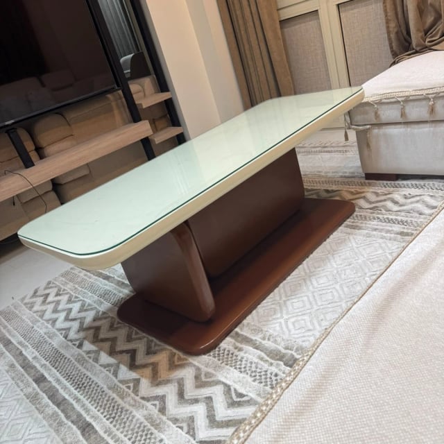 Cream glass-top table