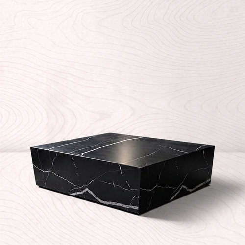 Black Marble Coffee Table in a Moody Modern Living Room photographed on the VARO pale wood-grain studio background