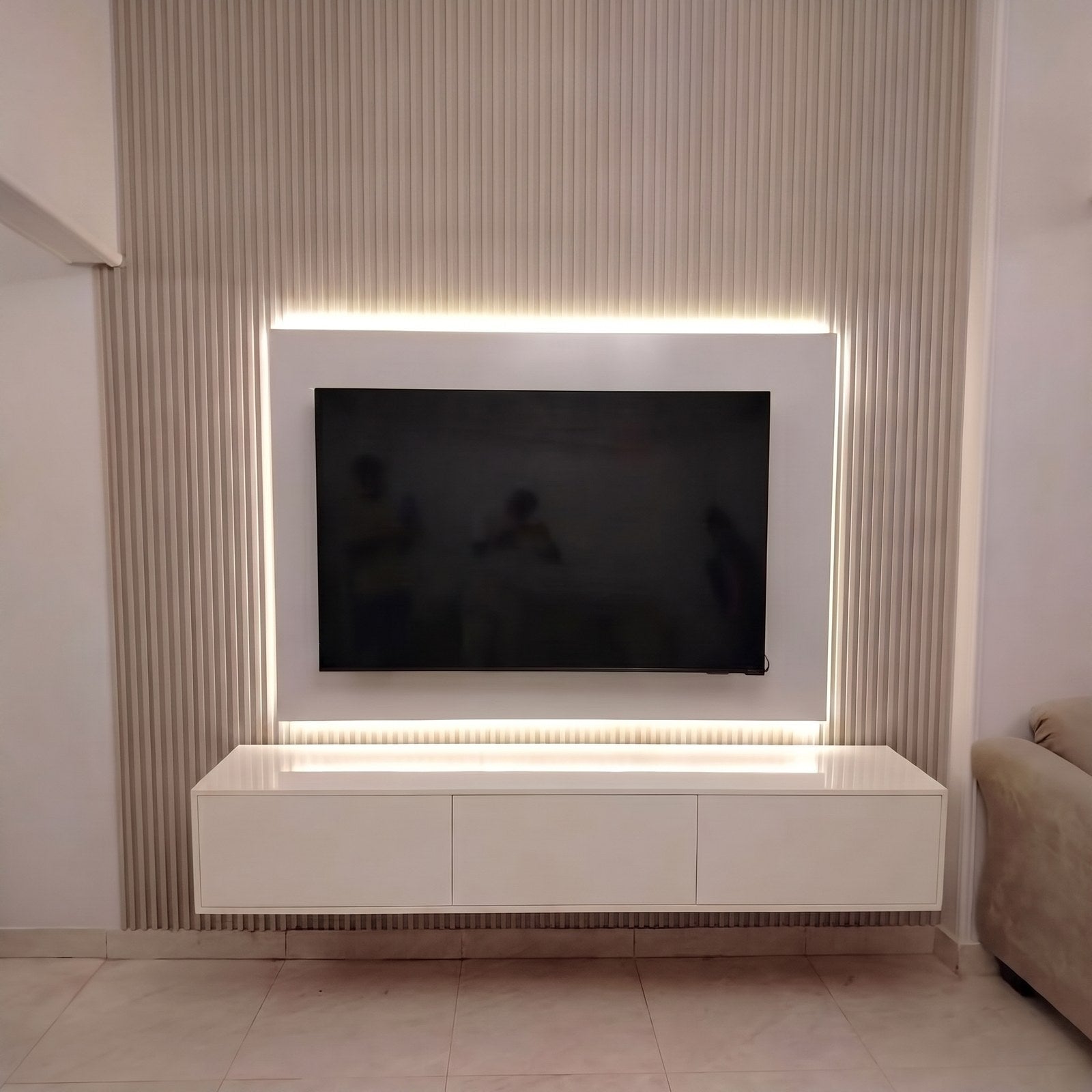 Floating TV unit — photographed in a delivered room; surrounding items not included