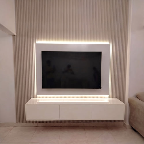 Floating TV unit — photographed in a delivered room; surrounding items not included