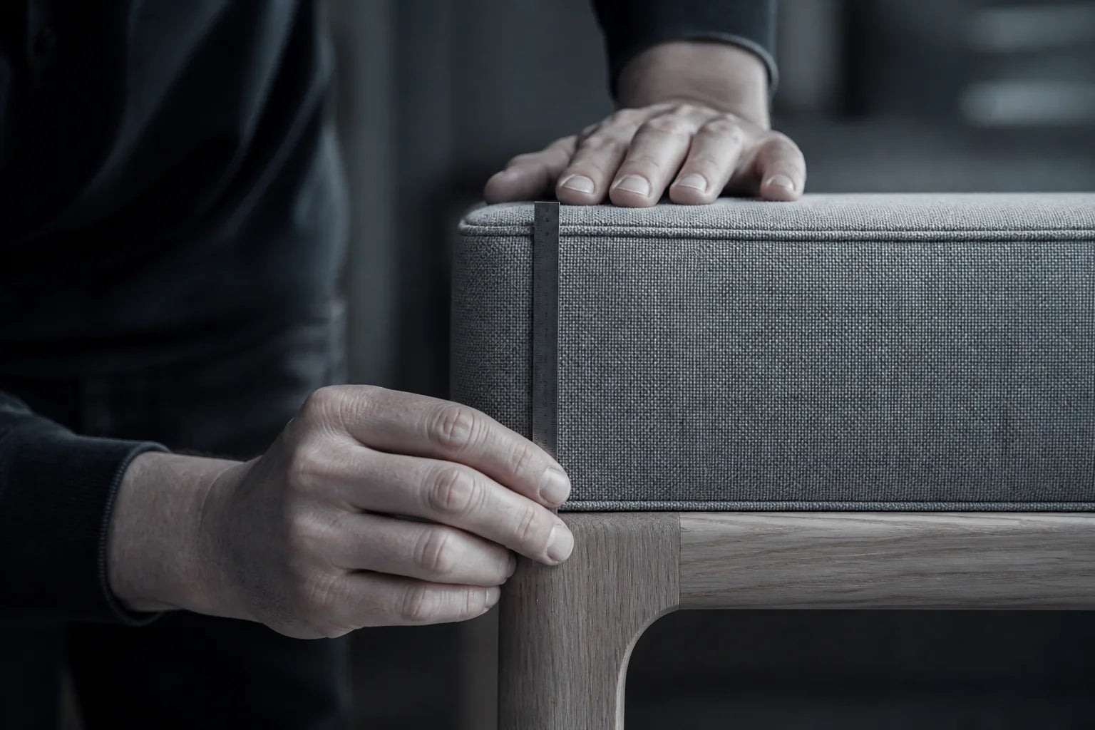 A finished furniture detail being inspected